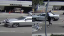 WATCH: woman hit by a car while fleeing a robbery in Los Angeles