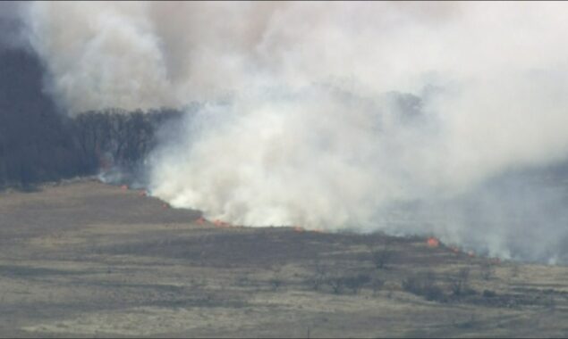 Wind-driven flames in the west force evacuations.