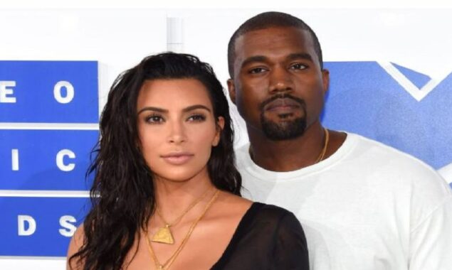 Kim Kardashian defends Kanye West as he drives their children to school in a fire truck