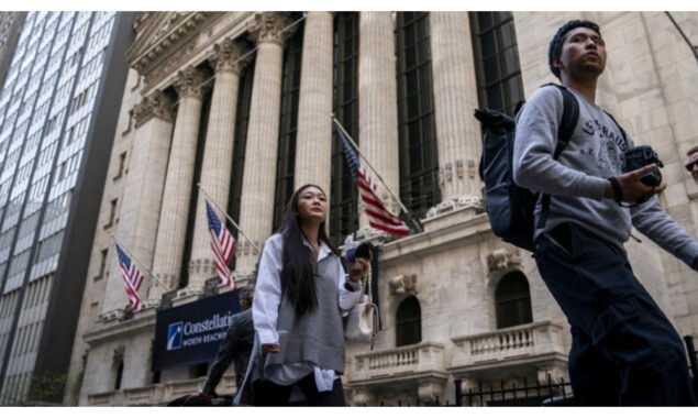 US stocks end volatile day mixed ahead of inflation data