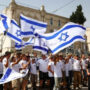 Israelis waving flags take to the streets, and skirmishes occur in the Al-Aqsa mosque