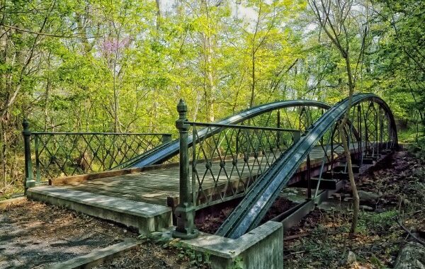 At the scene of an armed robbery in Maryland, a suspect drops his wallet, which contains his identification.
