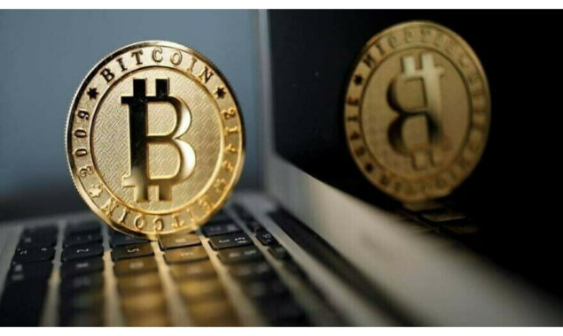 Bitcoin slumps under $25,000, lowest in 18 months