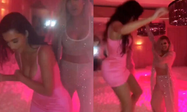 Kim Kardashian hides a lewd wardrobe malfunction as her curves protrude from her skintight dress