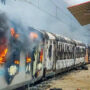 India trains set on fire in protest at military hiring changes