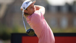 Smith: Australian leads Open, profound Woods misses cut