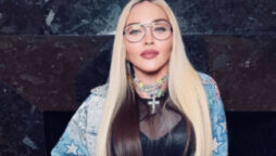 Madonna steps out for dinner in black lace top and shorts tights