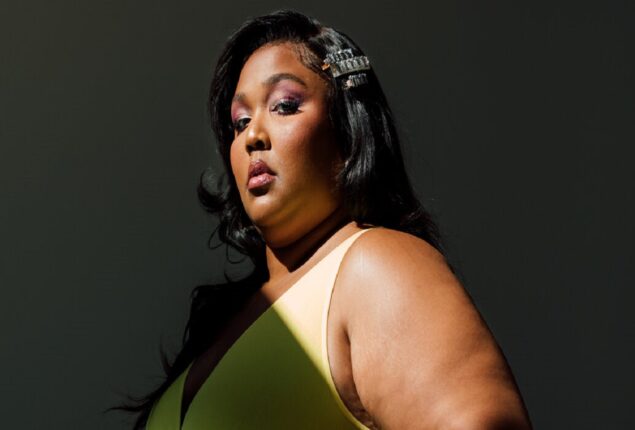 Lizzo wore a bridal gown to the beach