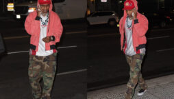 A$AP Rocky seems in good spirits as he walks in NYC streets