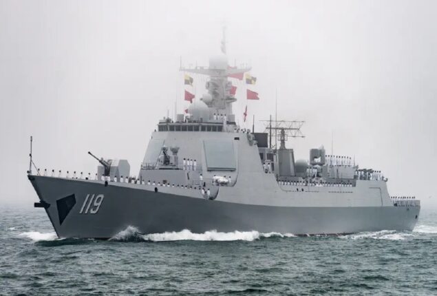 A US patrol observes Chinese and Russian military vessels