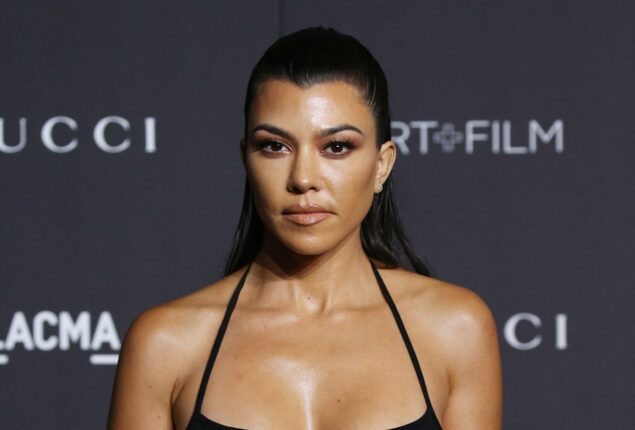 Kourtney Kardashian led some followers to speculate she is expecting a baby