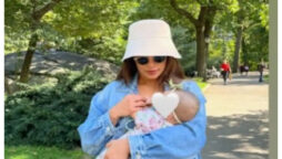 Priyanka Chopra carries daughter Malti during a walk