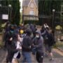 An alleged beating occurred on a Hong Kong demonstrator at the British Consulate