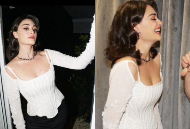 Esra Bilgic looks elegant in a white corset top