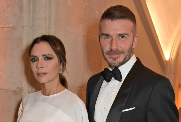 Victoria and David Beckham compete while decorating gingerbread houses