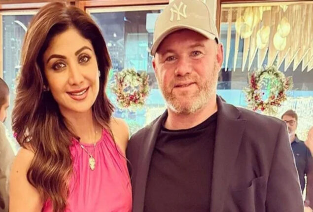 Shilpa Shetty is all smiles as she poses with Wayne Rooney
