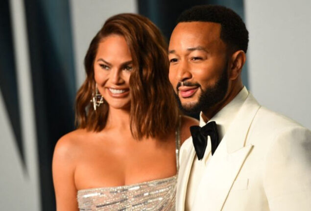 Chrissy Teigen and John Legend all cozy as they stroll after Grammys and daughter’s birth