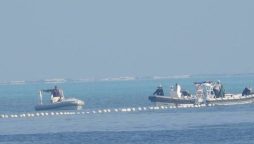 South China Sea Tension Rises as China Installs Floating Barrier