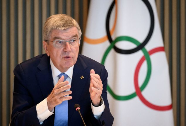 IOC members from Russia avoid suspension despite military links, says Bach