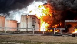 Ukraine says it struck an oil depot in Russia, as Moscow claims new gains in Donetsk region