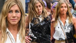 Jennifer Aniston reveals she gets crazy responses to her viral oil splash photos
