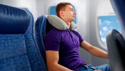 US man beats sleeping passenger