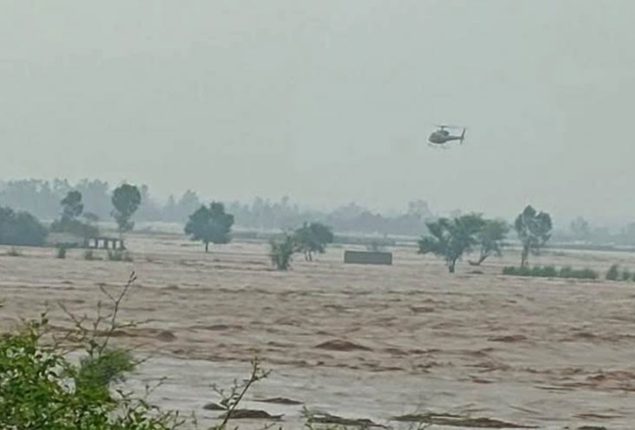 Pakistan Army rescues flood-trapped family via helicopter