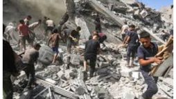 Six-year-old twins among dozens killed in Israeli strikes on Gaza city