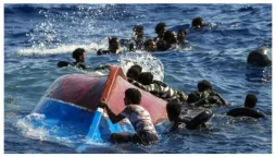 40 migrants, including infants, die after boat sinks off in Tunisia.