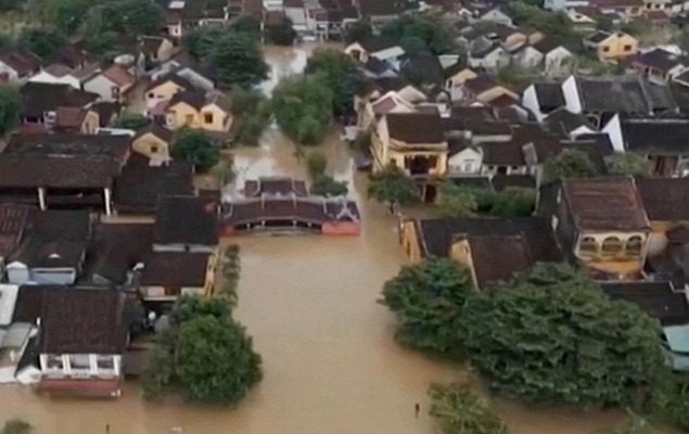 Death toll rises to 13 as floods devastate central Vietnam